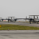 E-2D Advanced Hawkeye aircraft with Carrier Airborne Early Warning Squadron (VAW) 125 taxi down the flight line upon return to Marine Corps Air Station Iwakuni, Japan, August 9, 2017 (U.S. Marine Corps photo by Cpl. Aaron Henson)